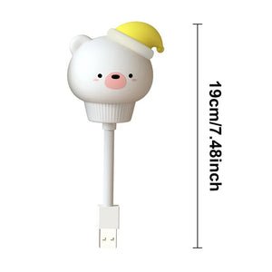 Veilleuse Cochon Blanc USB allumée sur fond blanc.