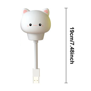 Veilleuse Chat USB allumée sur fond blanc.