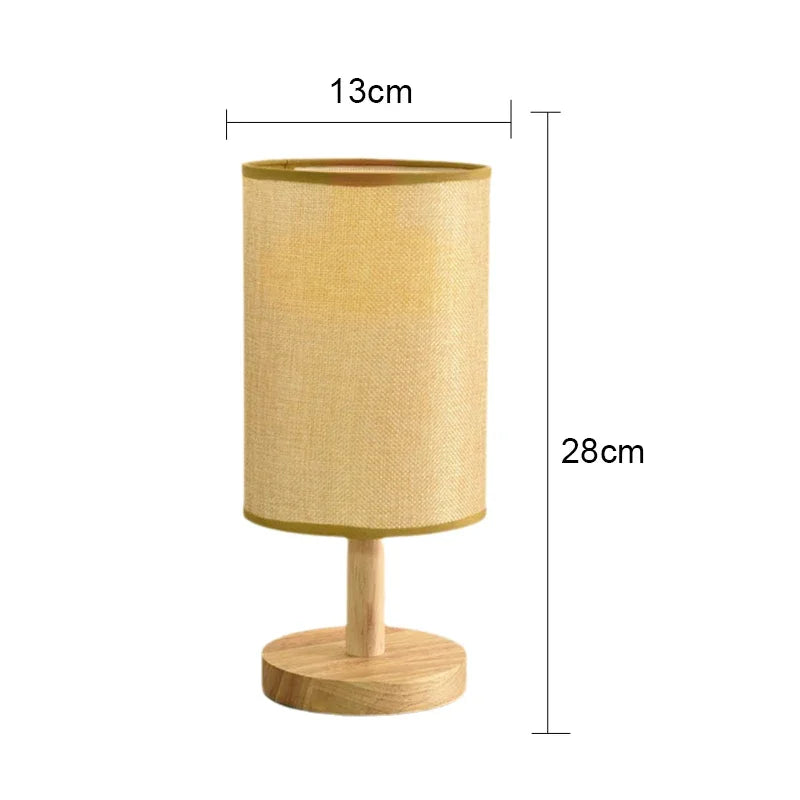 Schéma des dimensions de la lampe de chevet en bois avec abat-jour en lin beige indiquant une hauteur de 28cm et une largeur de 13cm