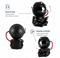 Infographie montrant la tête pivotante du projecteur astronaute noir pour un ajustement de haut en bas et de gauche à droite.