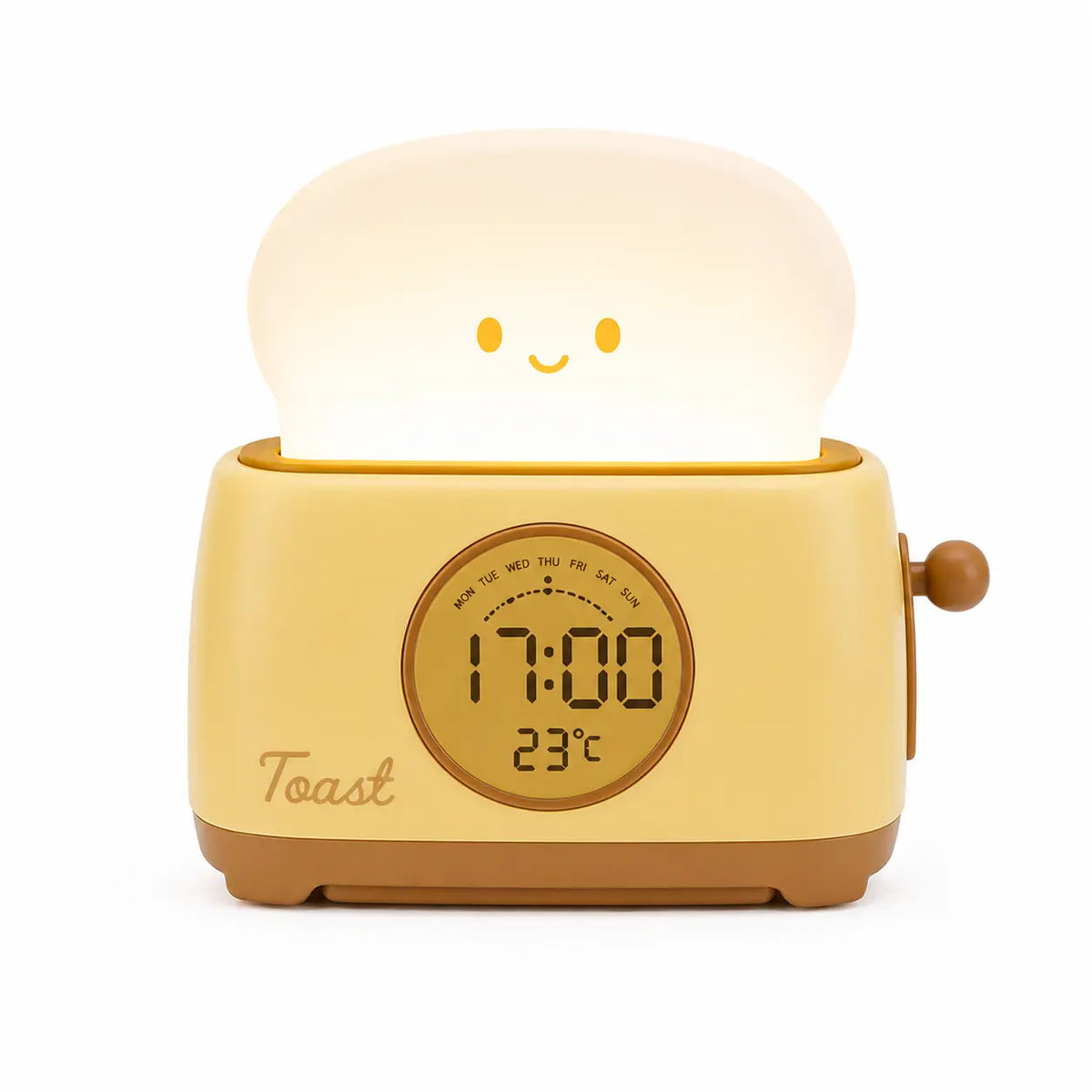 Réveil veilleuse en forme de grille-pain jaune crème avec une tranche de pain lumineuse et souriante, affichant l'heure et la température sur fond blanc.