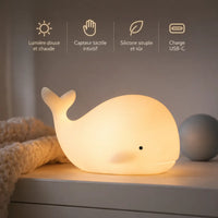 Veilleuse baleine en silicone illuminée avec pictogrammes : lumière douce et chaude, capteur tactile intuitif, silicone souple et sûr, charge USB-C