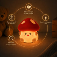 Infographie en français présentant les fonctionnalités d'une veilleuse champignon en silicone allumée. Le produit est entouré d'un cercle lumineux reliant quatre pictogrammes explicatifs : silicone souple et non toxique en haut, batterie rechargeable USB à droite, autonomie d'environ 6 heures en bas à gauche, et contrôle tactile et silencieux au-dessus. Un ours en peluche apparaît discrètement en arrière-plan.