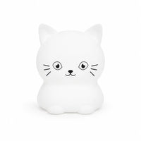Veilleuse en silicone en forme de petit chat blanc sur fond blanc.