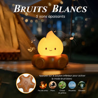 Veilleuse en forme de feu de camp allumée présentant sa fonction bruits blancs avec 5 sons apaisants