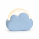 Veilleuse nomade en forme de nuage bleu diffusant une douce lumière chaude sur fond blanc