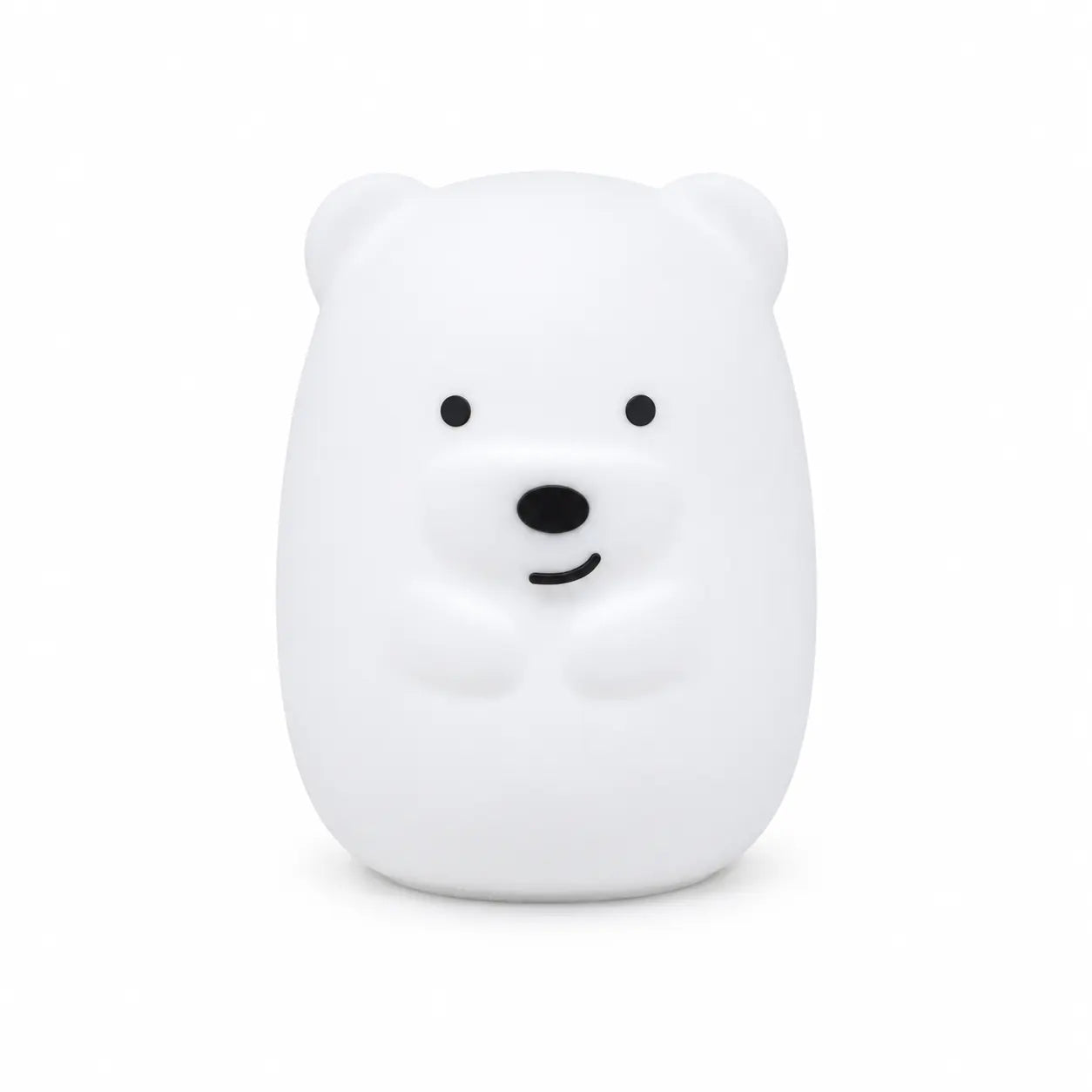 Veilleuse en silicone en forme de petit ours blanc, sur un fond blanc.