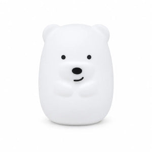Veilleuse en silicone en forme de petit ours blanc, sur un fond blanc.