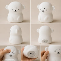 Différents angles de vue, texture souple en silicone et détails de la veilleuse en forme de petit singe blanc.